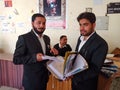 young lawyers working at court area wearing black uniform in India January 2020