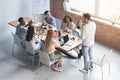 Young leader speeking at morning briefing in modern office Royalty Free Stock Photo