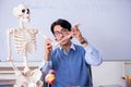 The young lecturer teacher teaching anatomy Royalty Free Stock Photo