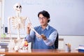 The young lecturer teacher teaching anatomy Royalty Free Stock Photo