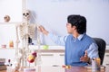 The young lecturer teacher teaching anatomy Royalty Free Stock Photo