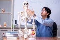 The young lecturer teacher teaching anatomy Royalty Free Stock Photo