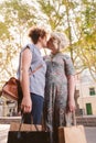 Young lesbian couple kissing each other on a city street Royalty Free Stock Photo