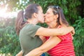 Young lesbian girls kissing at the park on a summer day Royalty Free Stock Photo