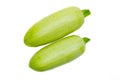 Young light green zucchini, organic natural on a white background. Zucchini sideways, on top. Two zucchini, zucchini tails