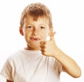 Young little boy isolated thumbs up on white gesturing