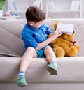 Young little boy with VR virtual reality glasses