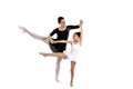 Young little girl ballerina learning dance lesson with ballet te