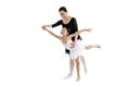 Young little girl ballerina learning dance lesson with ballet teacher