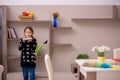 Young little girl doing housework at home Royalty Free Stock Photo