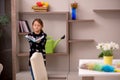 Young little girl doing housework at home Royalty Free Stock Photo