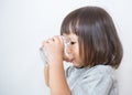 Young little girl drinking water. Royalty Free Stock Photo