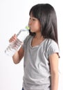 Young little girl drinking water. Royalty Free Stock Photo