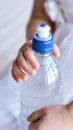 Young little girl hold water bottle. Kid drink cold fresh. Thirsty female person Royalty Free Stock Photo