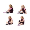 Young little girl sitting over isolated white background Royalty Free Stock Photo