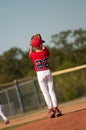 Youth pitcher checking second base Royalty Free Stock Photo