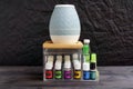 Young living essential oil bottles are neatly stored in an acrylic box