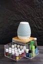 Young living essential oil bottles are neatly stored in an acrylic box