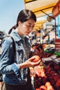 Young local asian lady in farmer market Royalty Free Stock Photo