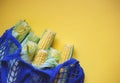 Young local corn in a blue eco friendly shopping bag Royalty Free Stock Photo