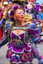 Young local woman dancing during Festival of the Virgin de la Ca