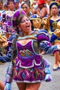 Young local woman dancing during Festival of the Virgin de la Ca