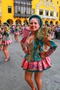 Young local woman dancing during Festival of the Virgin de la Ca