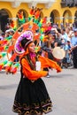 Young local woman performing during Festival of the Virgin de la