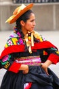 Young local woman performing suring Festival of the Virgin de la