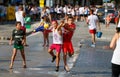 Childs playing with water balloons at the water battle in Santa Maria in mallorca