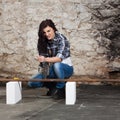 Young long-haired woman with an angle grinder Royalty Free Stock Photo