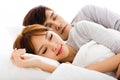 young lovely couple lying in a bed Royalty Free Stock Photo