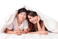 Young lovely couple lying in a bed Royalty Free Stock Photo