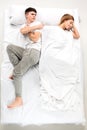 The young lovely couple lying in a bed Royalty Free Stock Photo