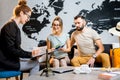 Couple at the travel agency office Royalty Free Stock Photo