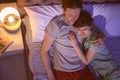 Young lovely couple sleeping in bed Royalty Free Stock Photo