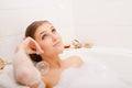 Young lovely woman in foam bath Royalty Free Stock Photo