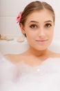 Young lovely woman in foam bath Royalty Free Stock Photo