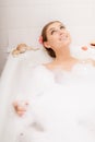 Young lovely woman in foam bath Royalty Free Stock Photo