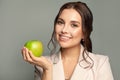 Young lovely woman with green apple portrait Royalty Free Stock Photo