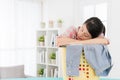 Young lovely woman sleeping on laundry basket Royalty Free Stock Photo