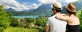 Young lovers couple watching lake of Annecy. France
