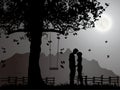 Young Lovers under Moonlight, Kissing Royalty Free Stock Photo