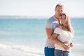 Young loving couple on the beach near the sea Royalty Free Stock Photo