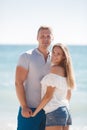 Young loving couple on the beach near the sea Royalty Free Stock Photo