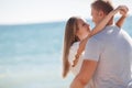 Young loving couple on the beach near the sea Royalty Free Stock Photo