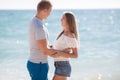 Young loving couple on the beach near the sea Royalty Free Stock Photo