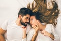 Young loving couple in the bed Royalty Free Stock Photo
