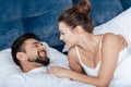 Young loving couple embrace in bed Royalty Free Stock Photo