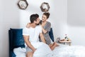 Young loving couple embrace in bed Royalty Free Stock Photo